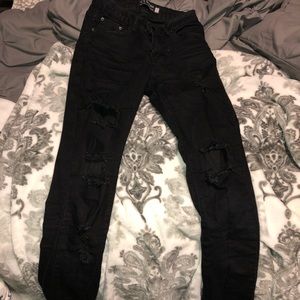 black ripped jeans